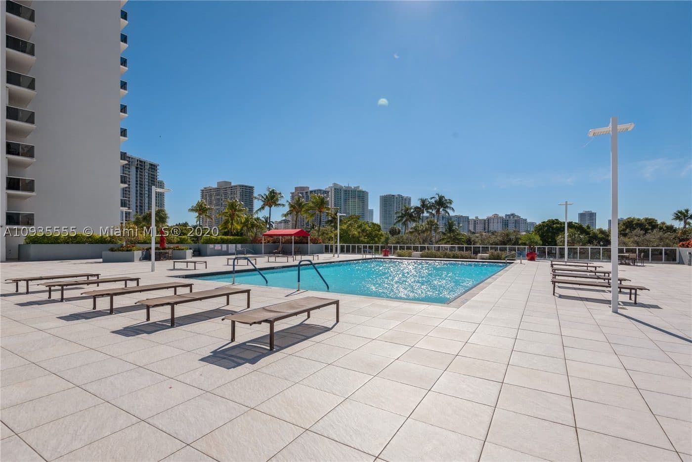 The pool deck with the towers behind it